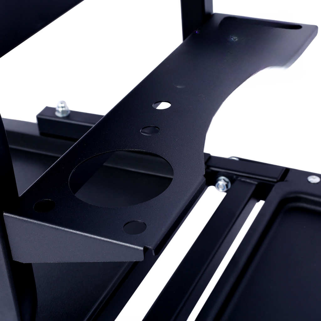 Closeup of a black metal DJ stand shelf with a circular cutout for cables