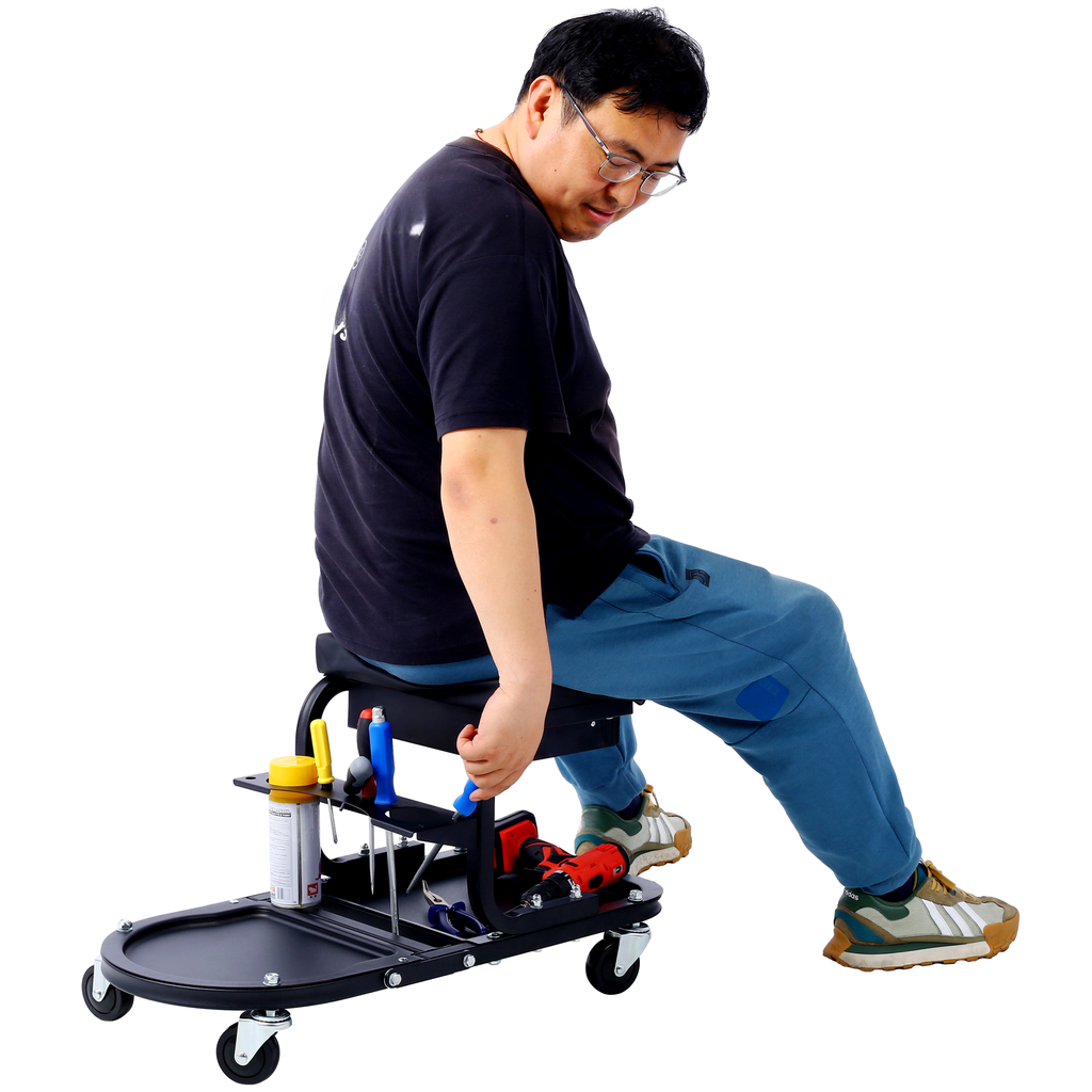 Black rolling creeper seat with integrated tool organizer and drill for mechanics