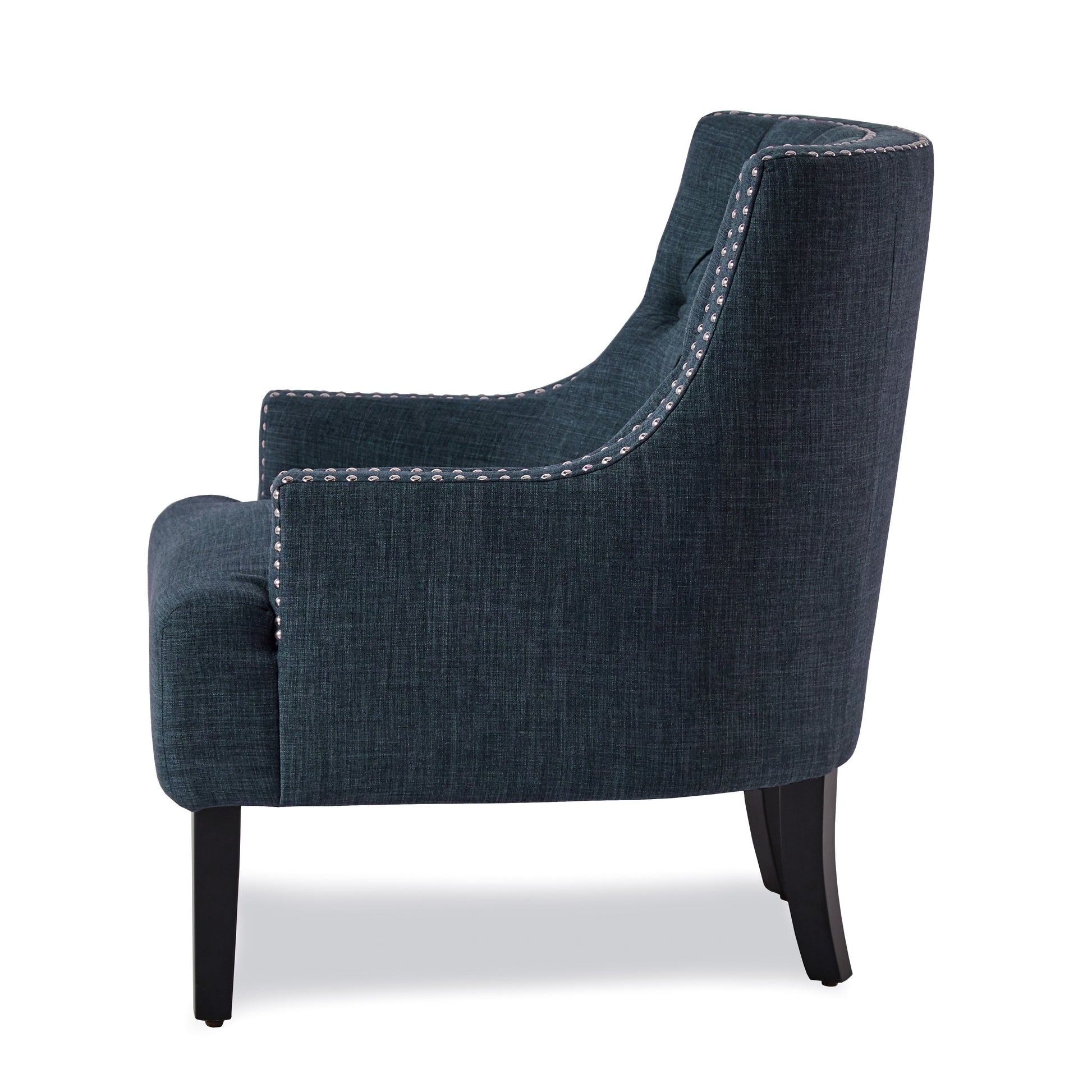 Dark blue fabric armchair with tufted back and nailhead trim