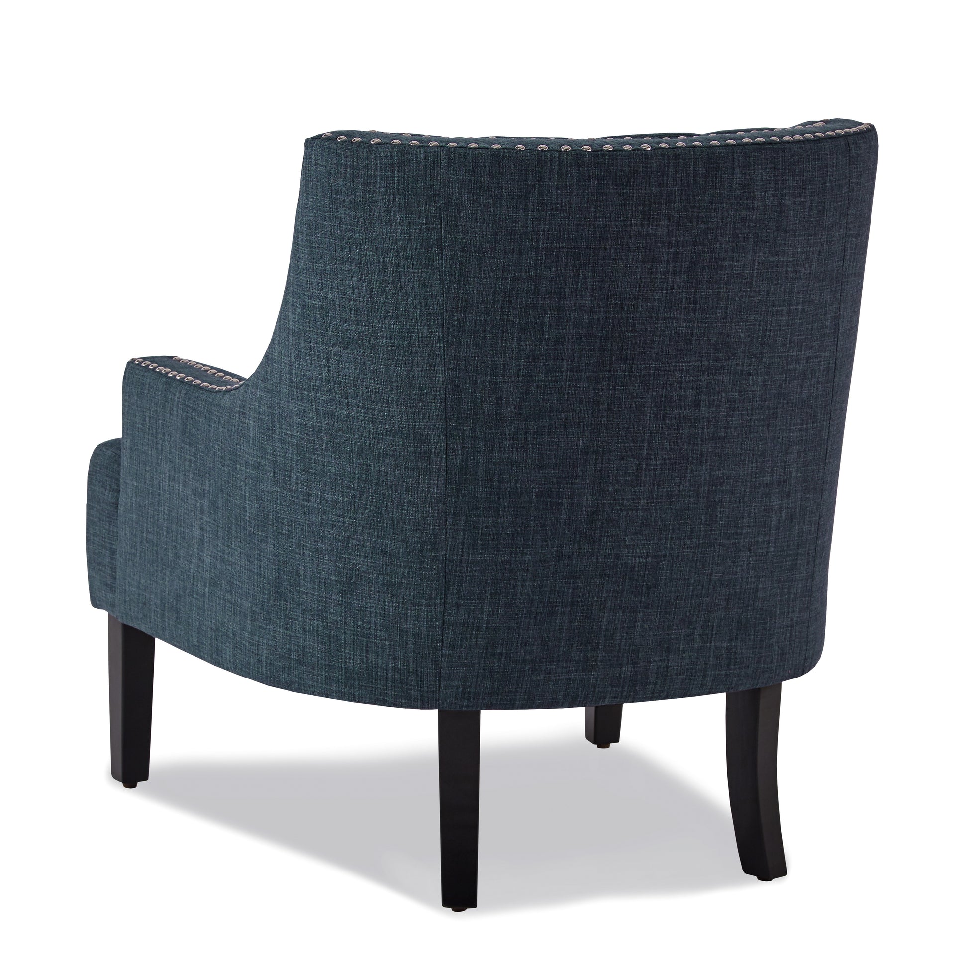 Dark teal fabric armchair with silver stud trim and dark wooden legs from the back