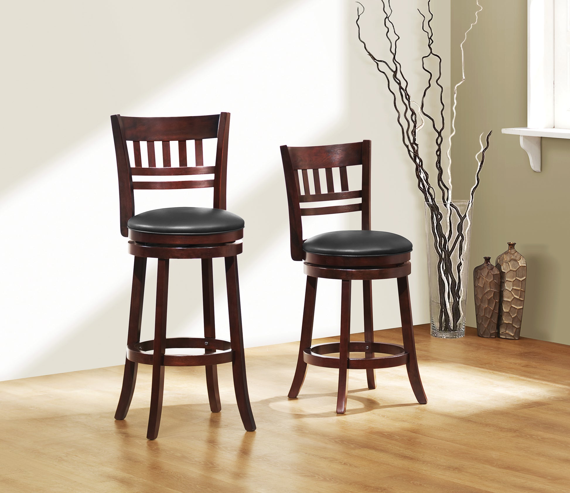 Dark wood swivel bar stool with black cushioned seat ideal for kitchen islands