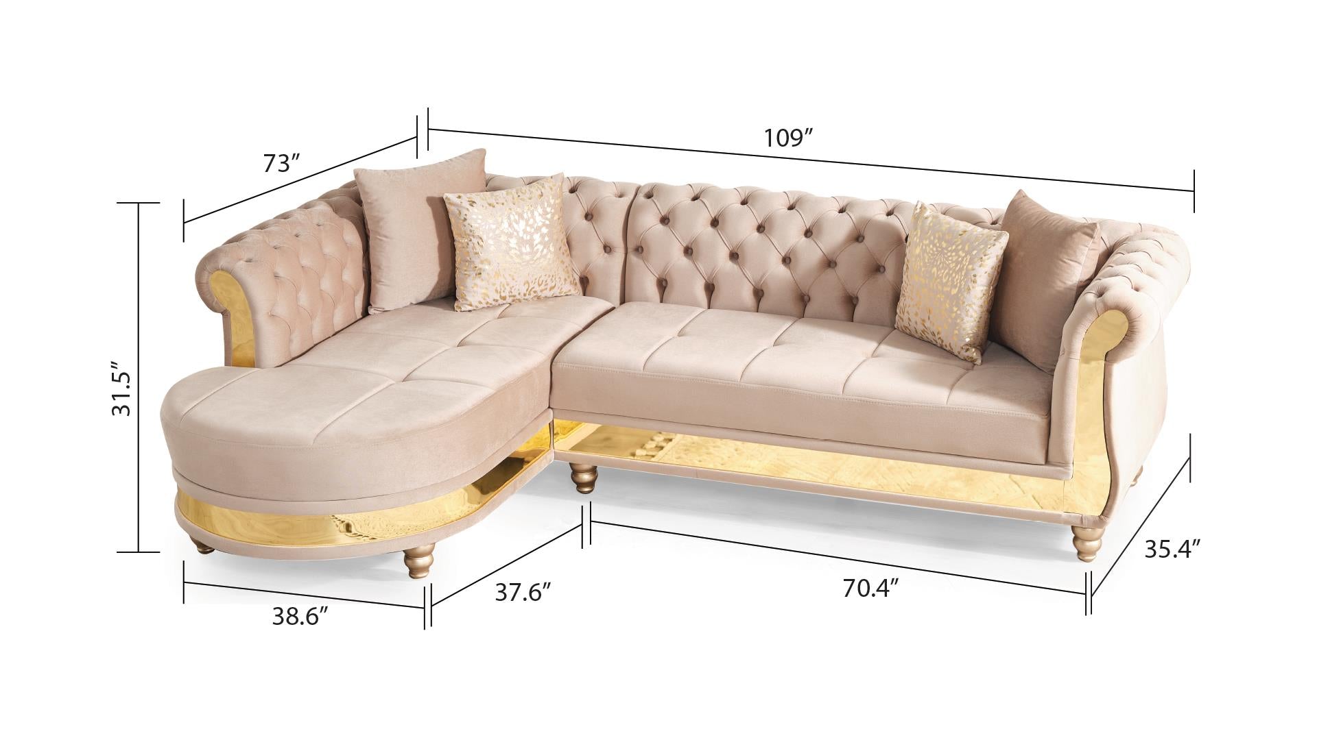 Tufted beige velvet sectional sofa with gold accents and decorative pillows