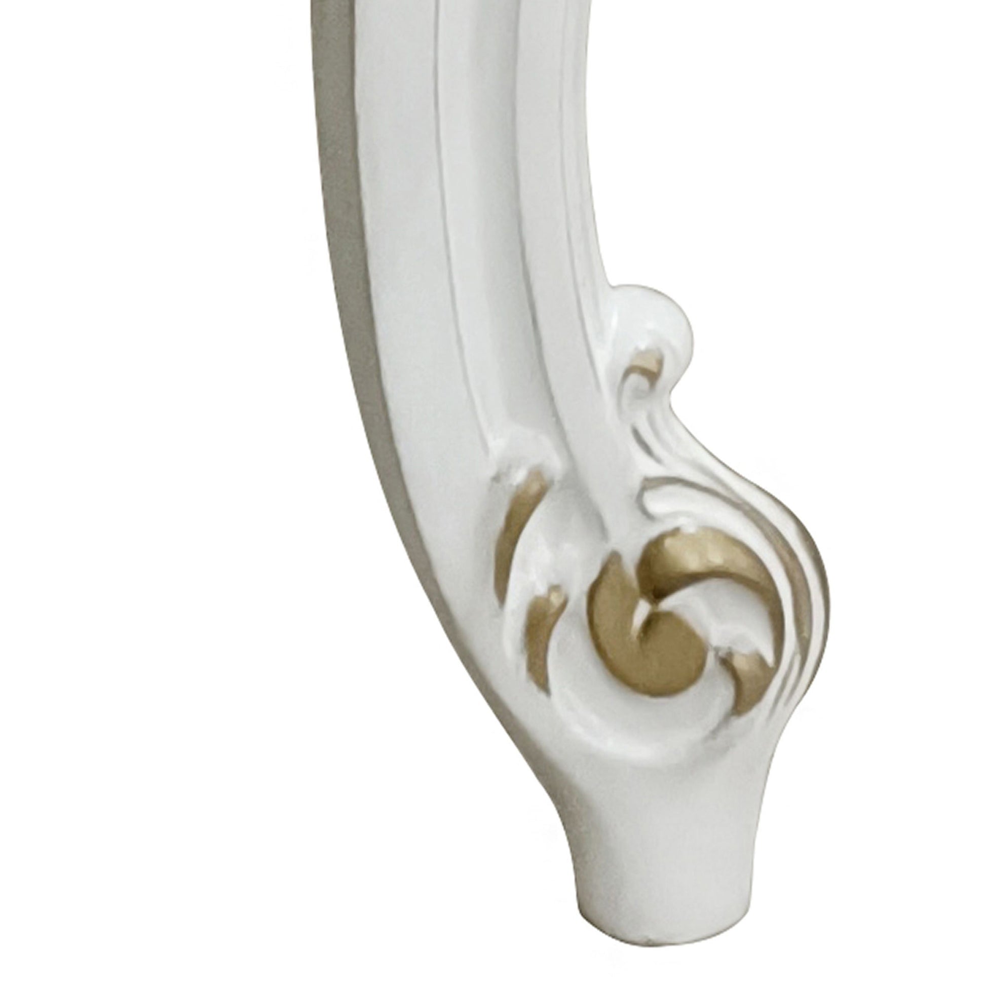 White ornate furniture leg with gold scroll detail
