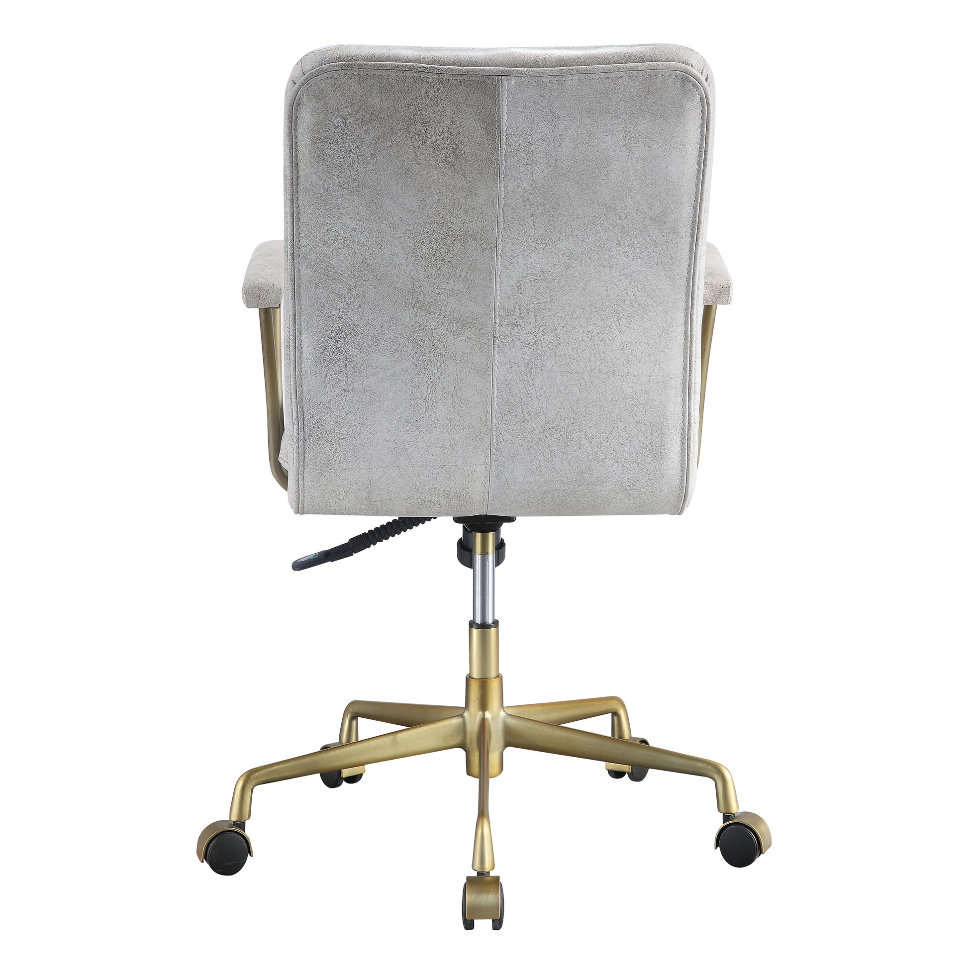 Gray upholstered desk chair with gold base and casters tufted back