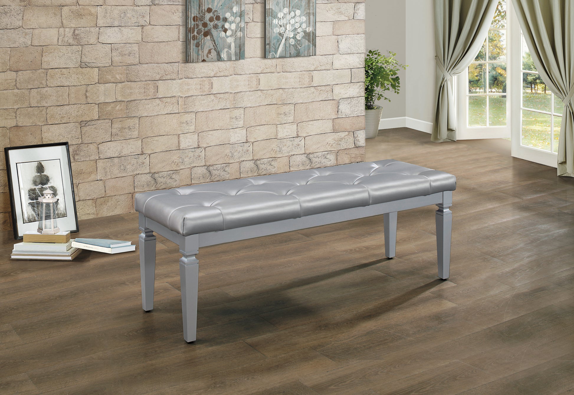 Tufted silver faux leather bench with gray wooden legs for entryways or bedrooms