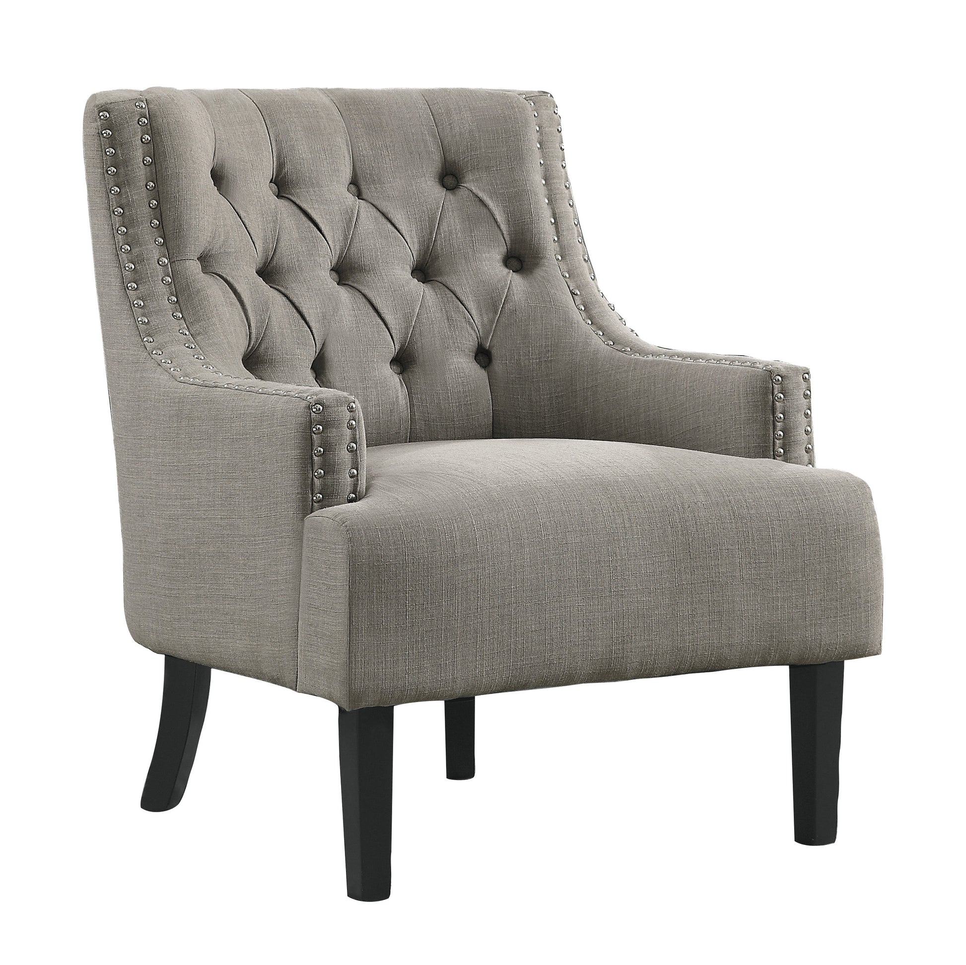Tufted grey accent chair with silver nailhead trim and black wooden legs