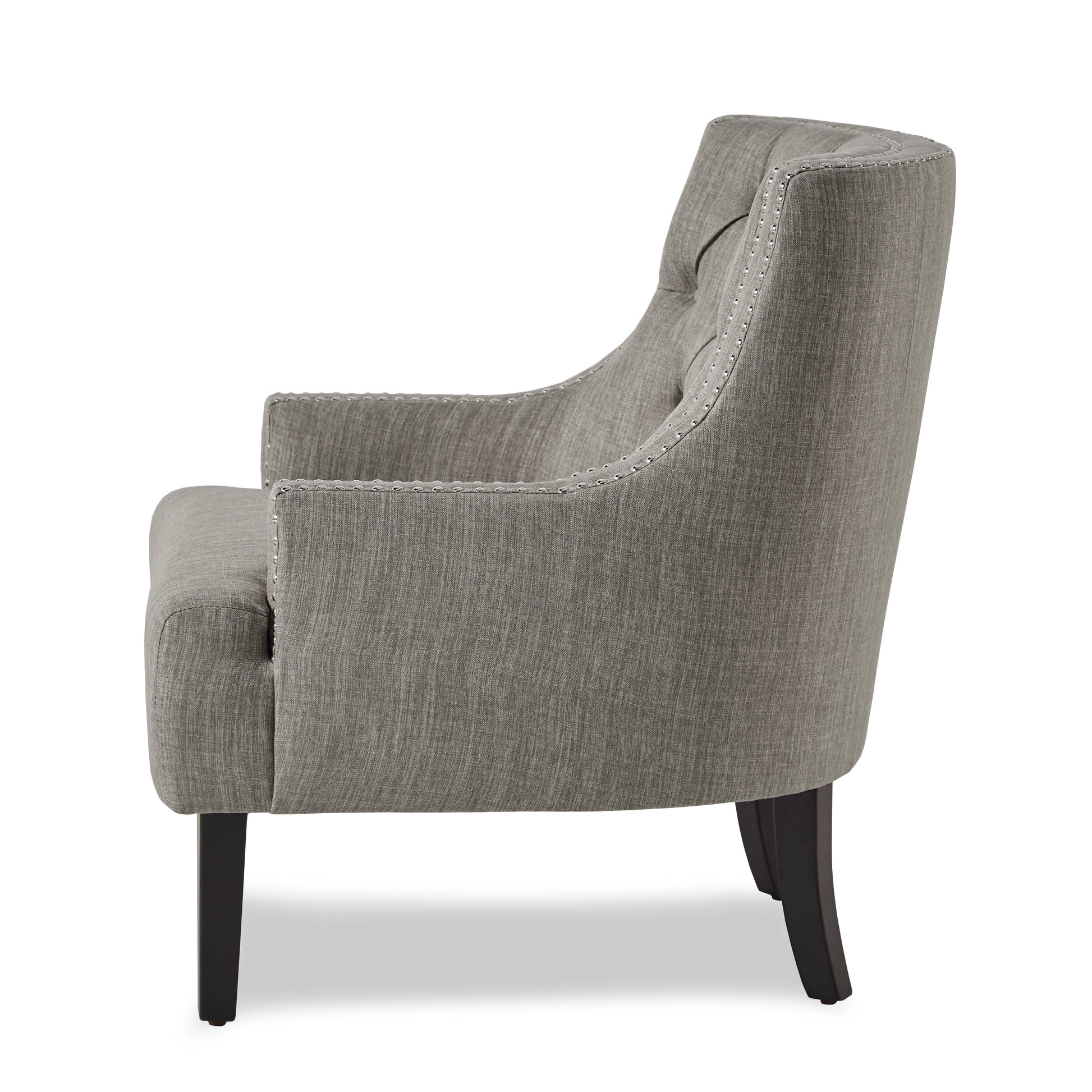 Tufted grey fabric accent chair with silver nailhead trim and dark wooden legs
