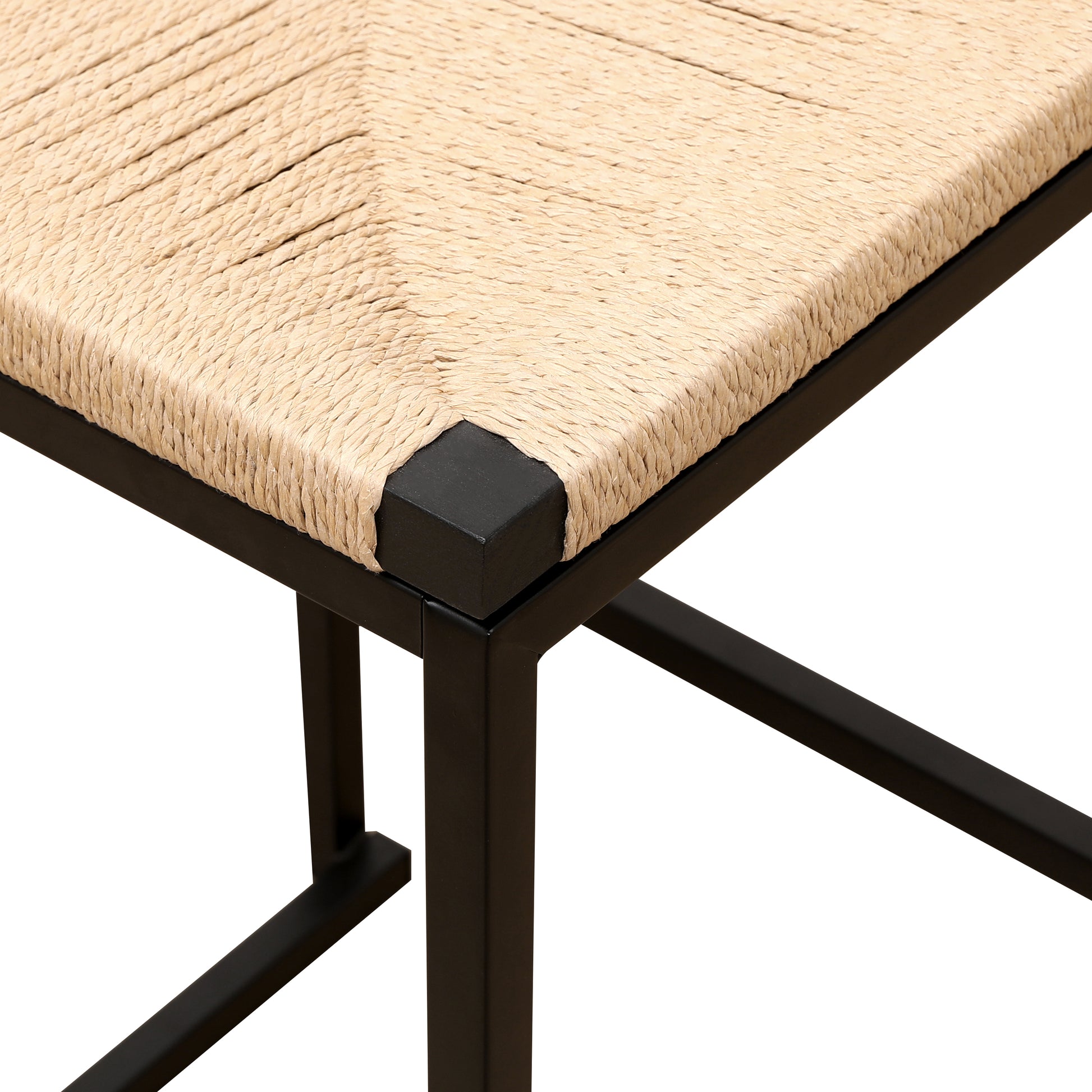 Closeup of a woven natural fiber stool seat with a black metal frame