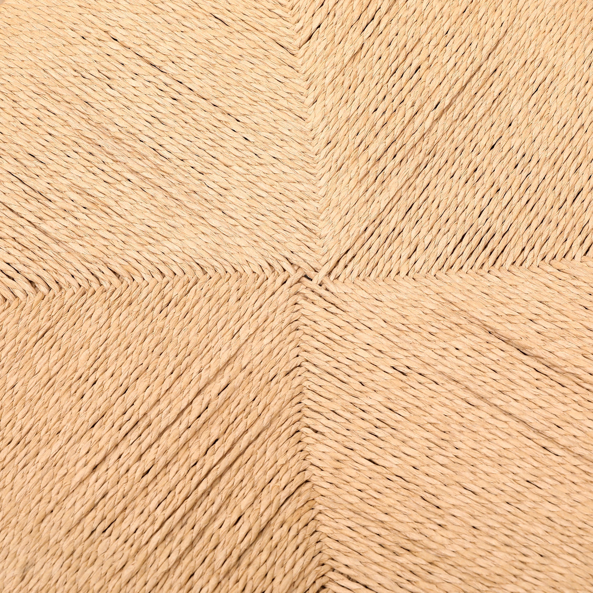 Closeup of natural beige raffia woven seat detail showing intricate texture