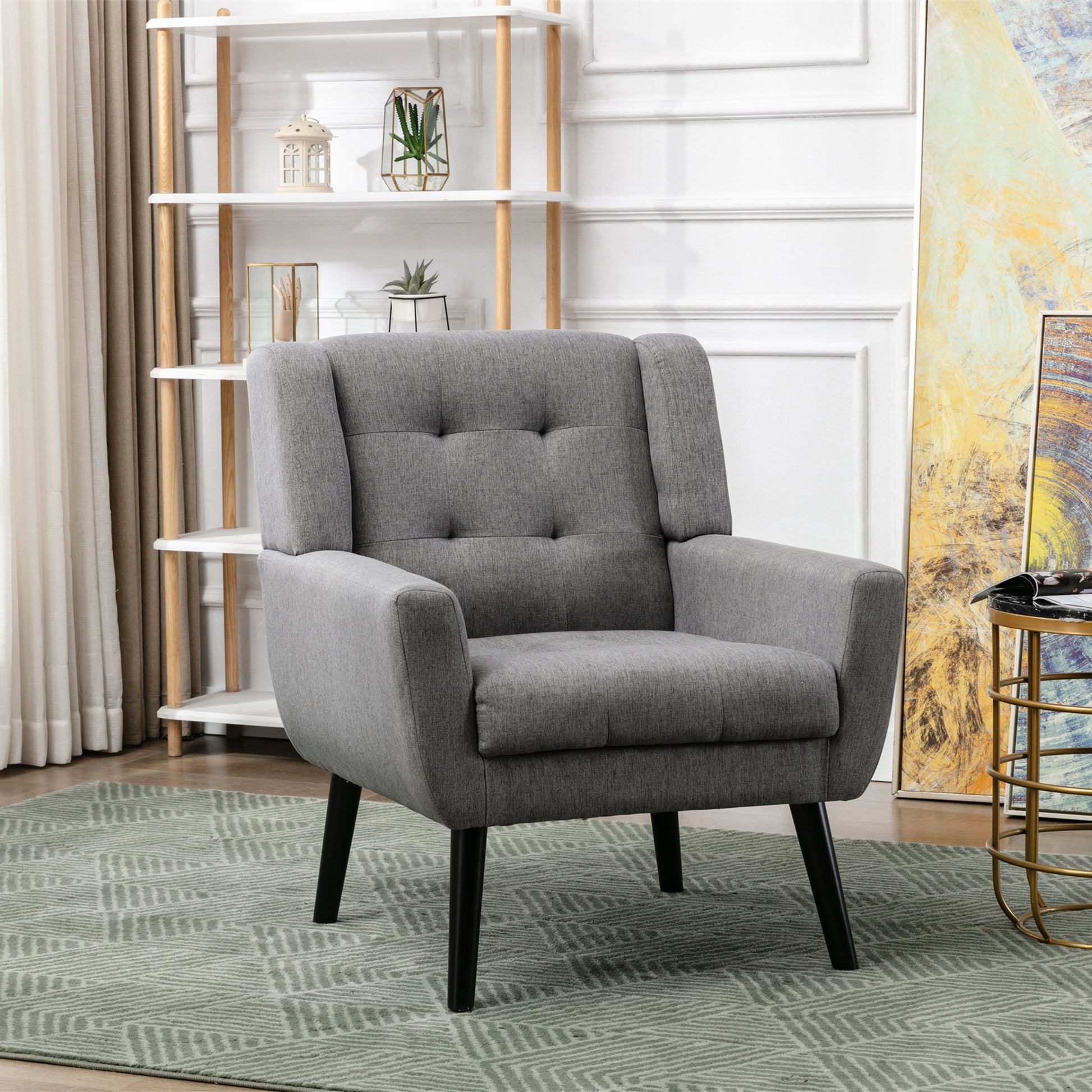 Tufted grey fabric accent chair with black tapered legs a stylish armchair