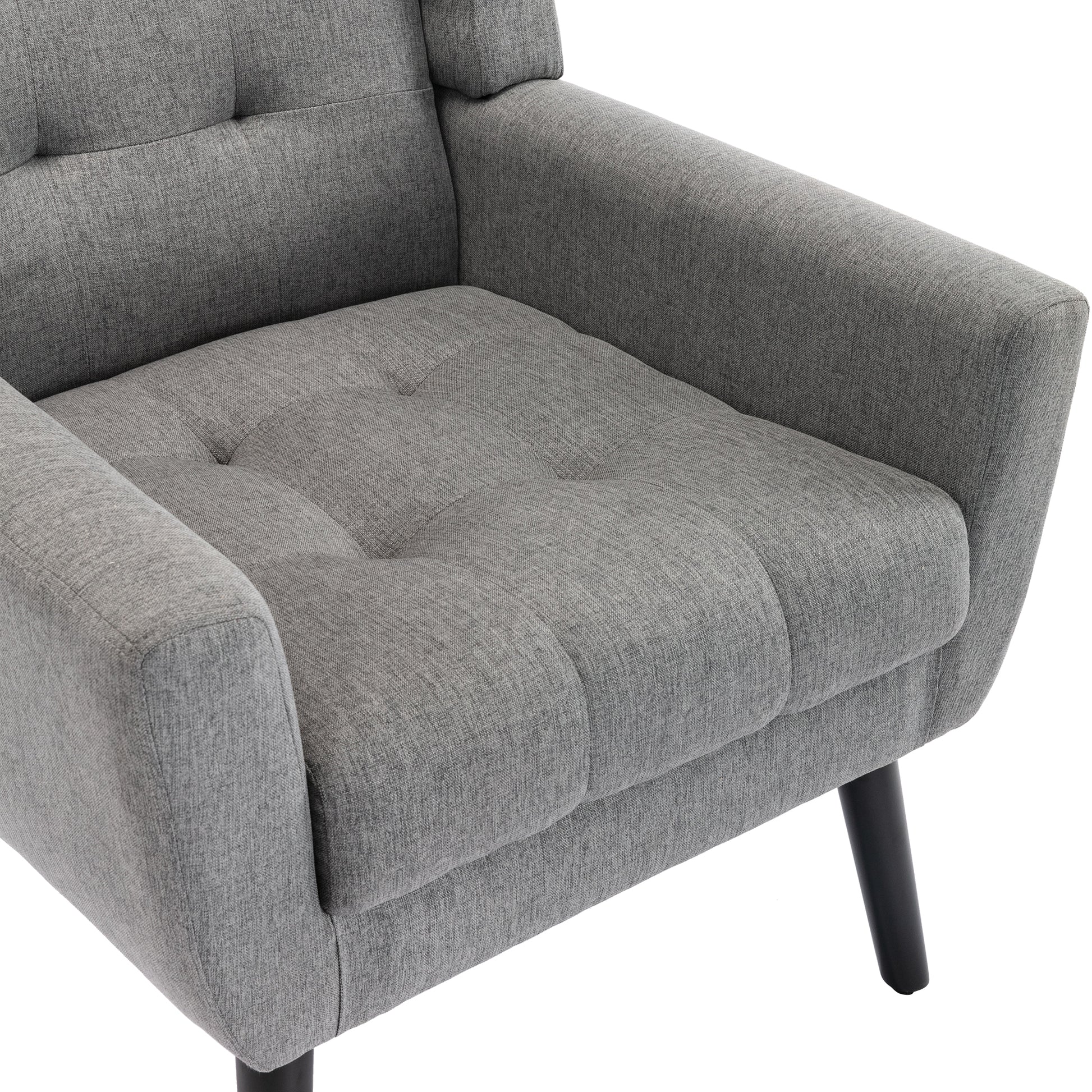 Tufted grey fabric accent chair with black tapered legs