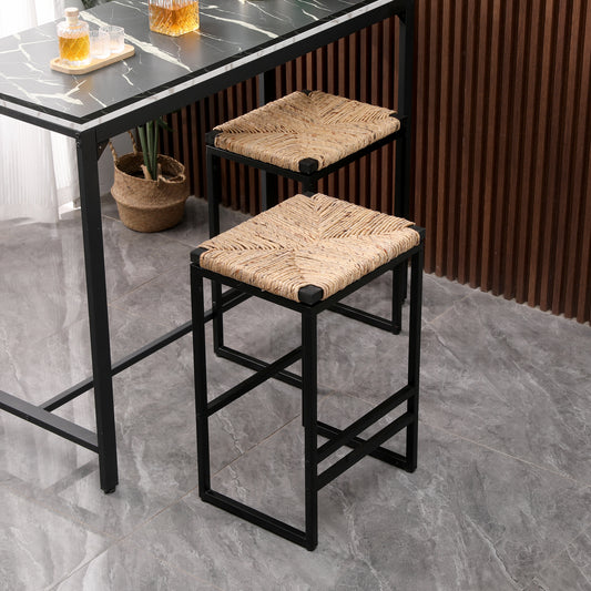 Woven natural raffia bar stool with a black metal frame perfect for modern kitchens
