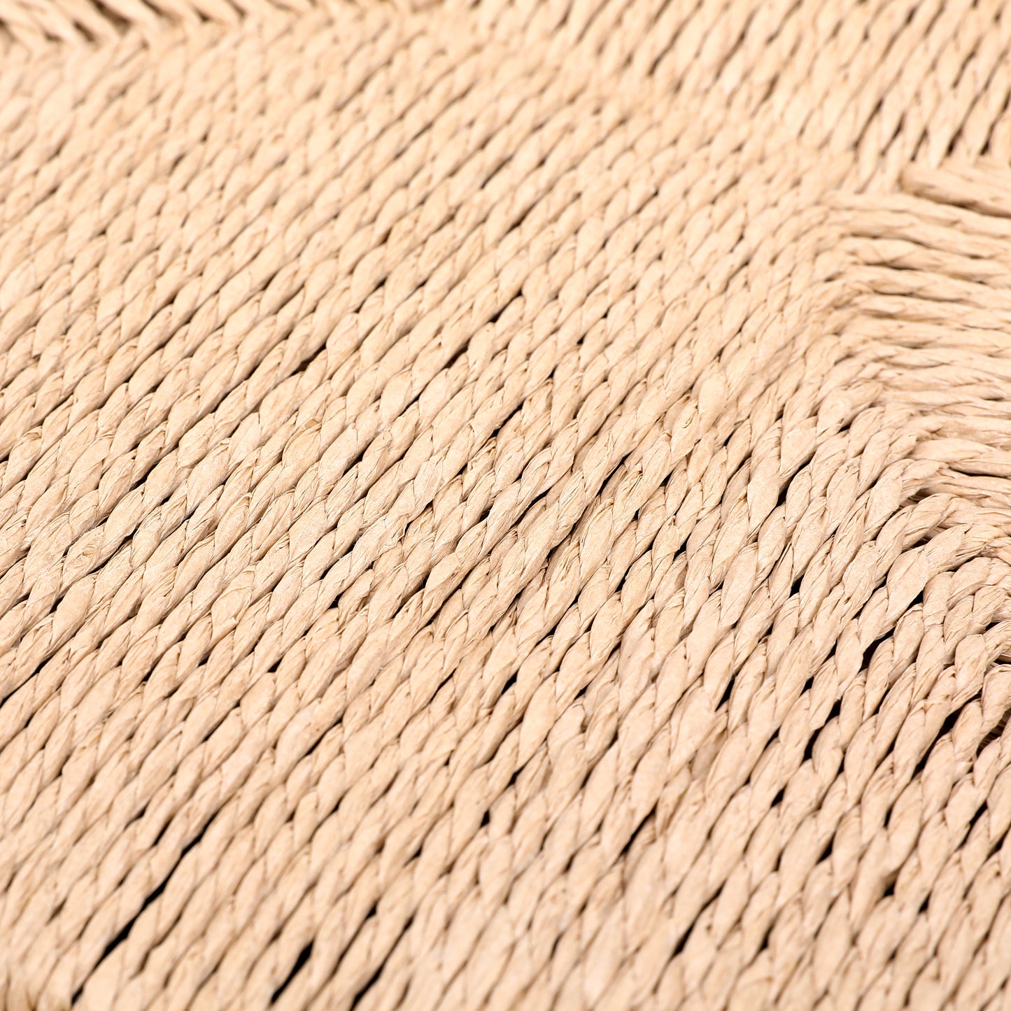 Closeup of natural raffia weave texture beige woven basket material