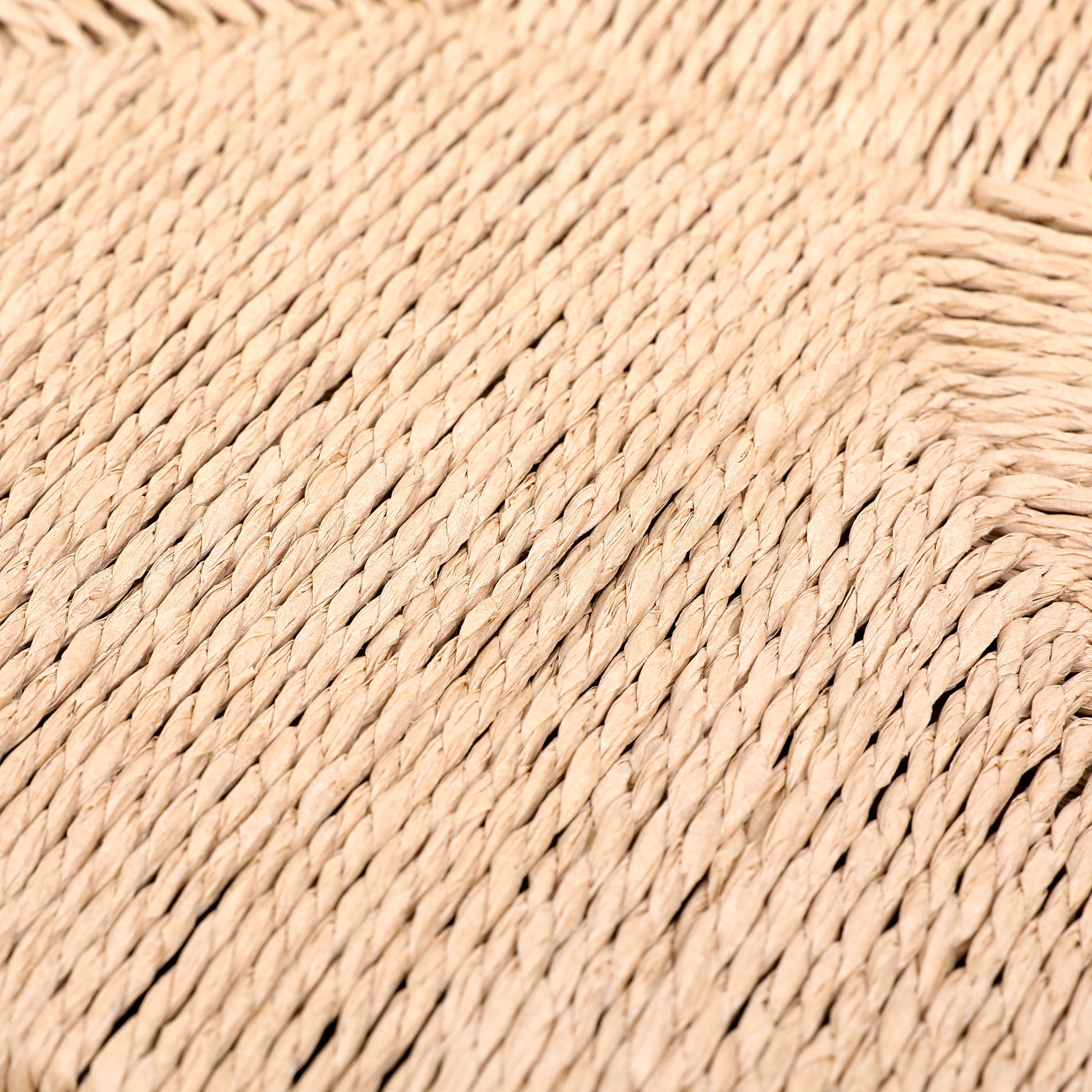 Closeup of natural raffia weave texture beige woven basket material