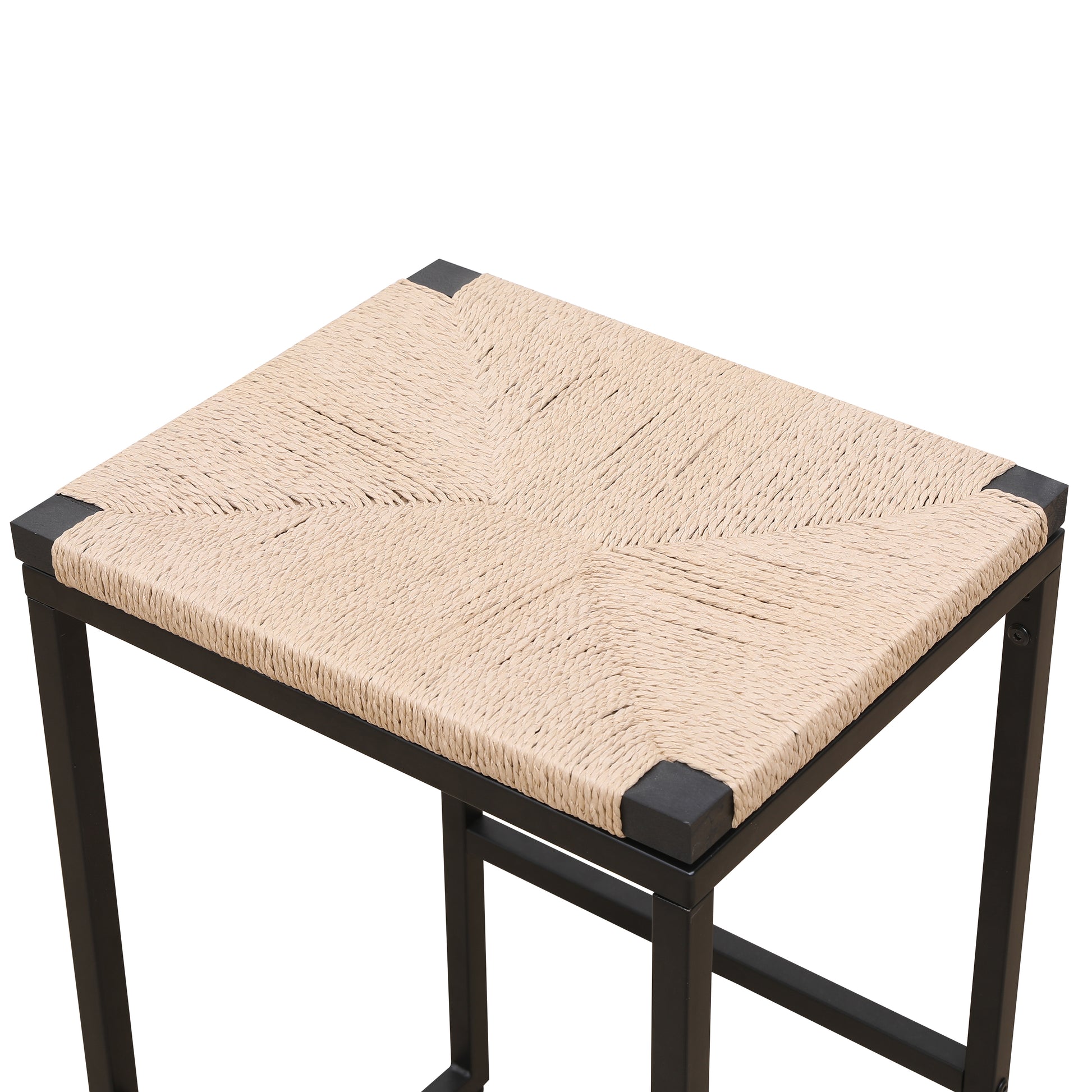 Closeup of a natural woven straw seat with a black metal frame bar stool