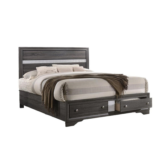 Gray wood platform bed with storage drawers and metallic accent on headboard