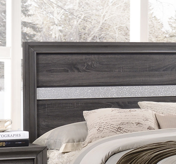 Dark grey wood headboard with a shimmering silver inlay strip