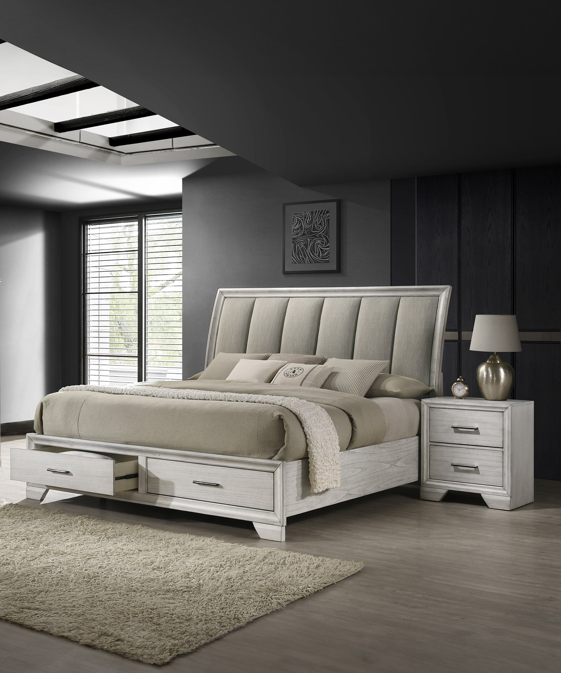 Gray upholstered platform bed with storage drawers and a tufted headboard
