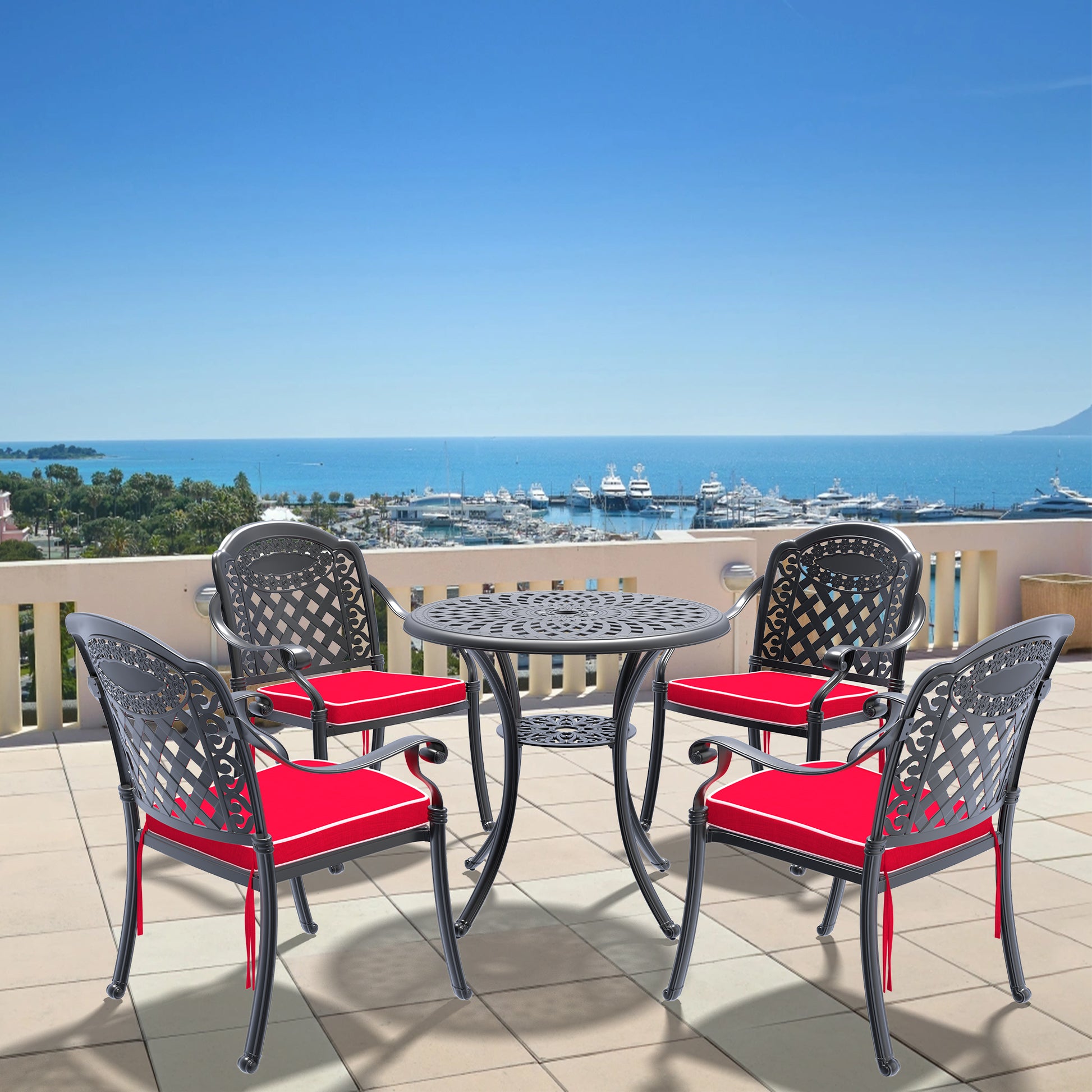Ornate black cast aluminum patio dining set with red cushions