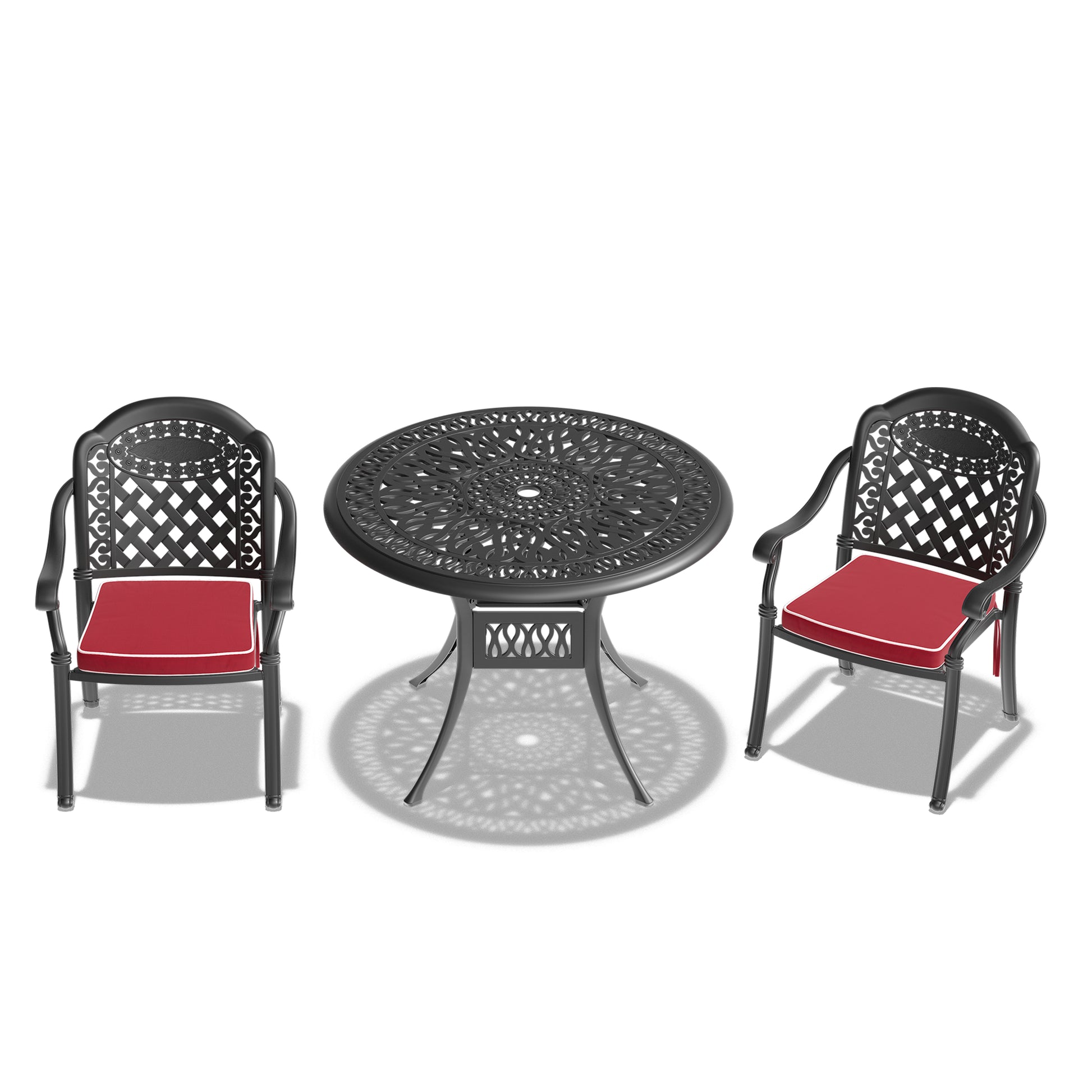 Ornate black cast aluminum bistro set with red seat cushions for patio dining