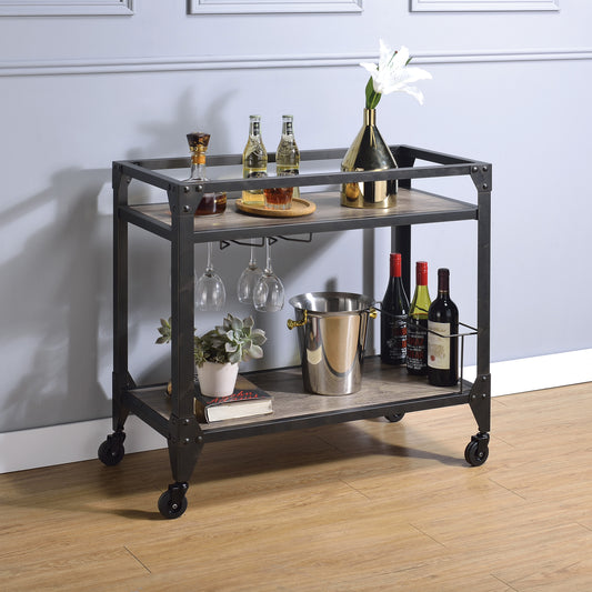 Industrial style bar cart with rustic wood shelves metal frame and caster wheels holding wine bottles