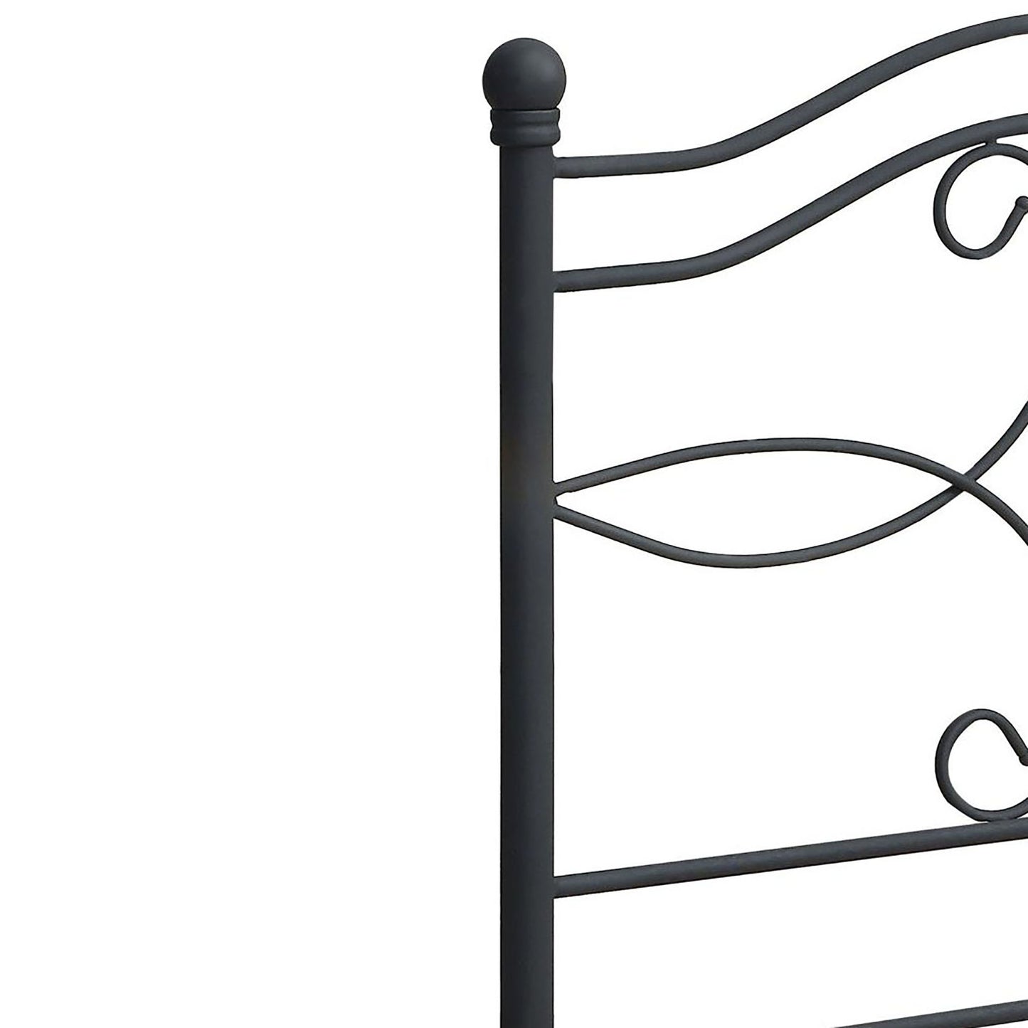 Dark grey metal bed frame detail with finial