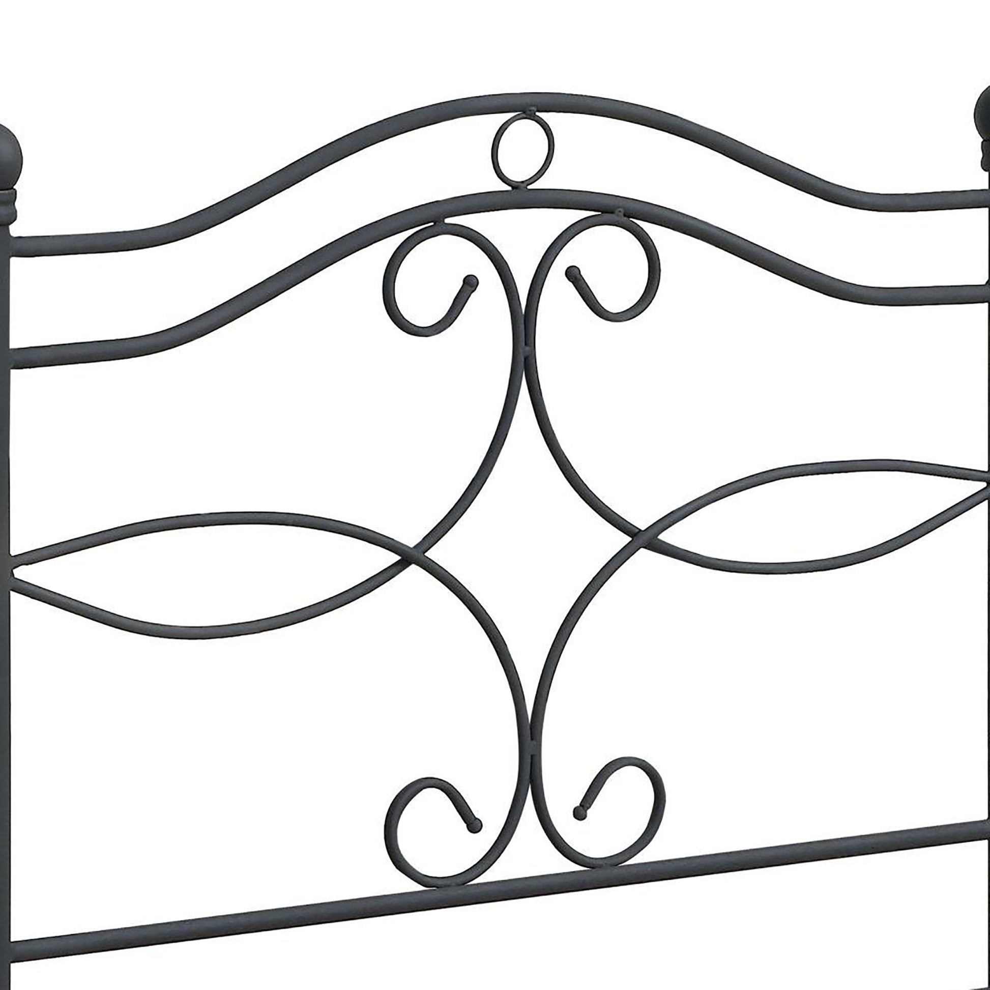 Dark gray wrought iron bed frame with scrollwork detail and finial accents