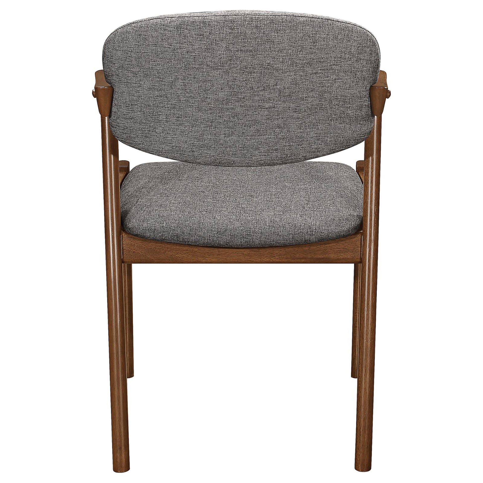 Grey fabric dining chair with curved back and walnut wood frame