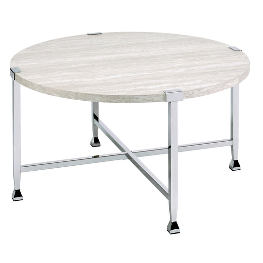 Round travertine coffee table with polished chrome legs and crossbar support