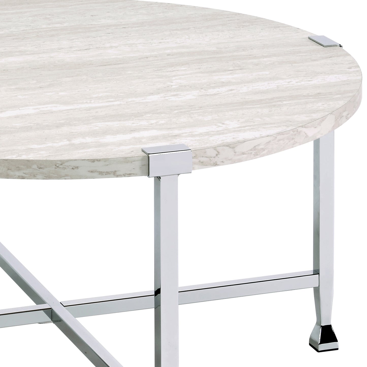 Round marble coffee table with chrome legs and modern accents