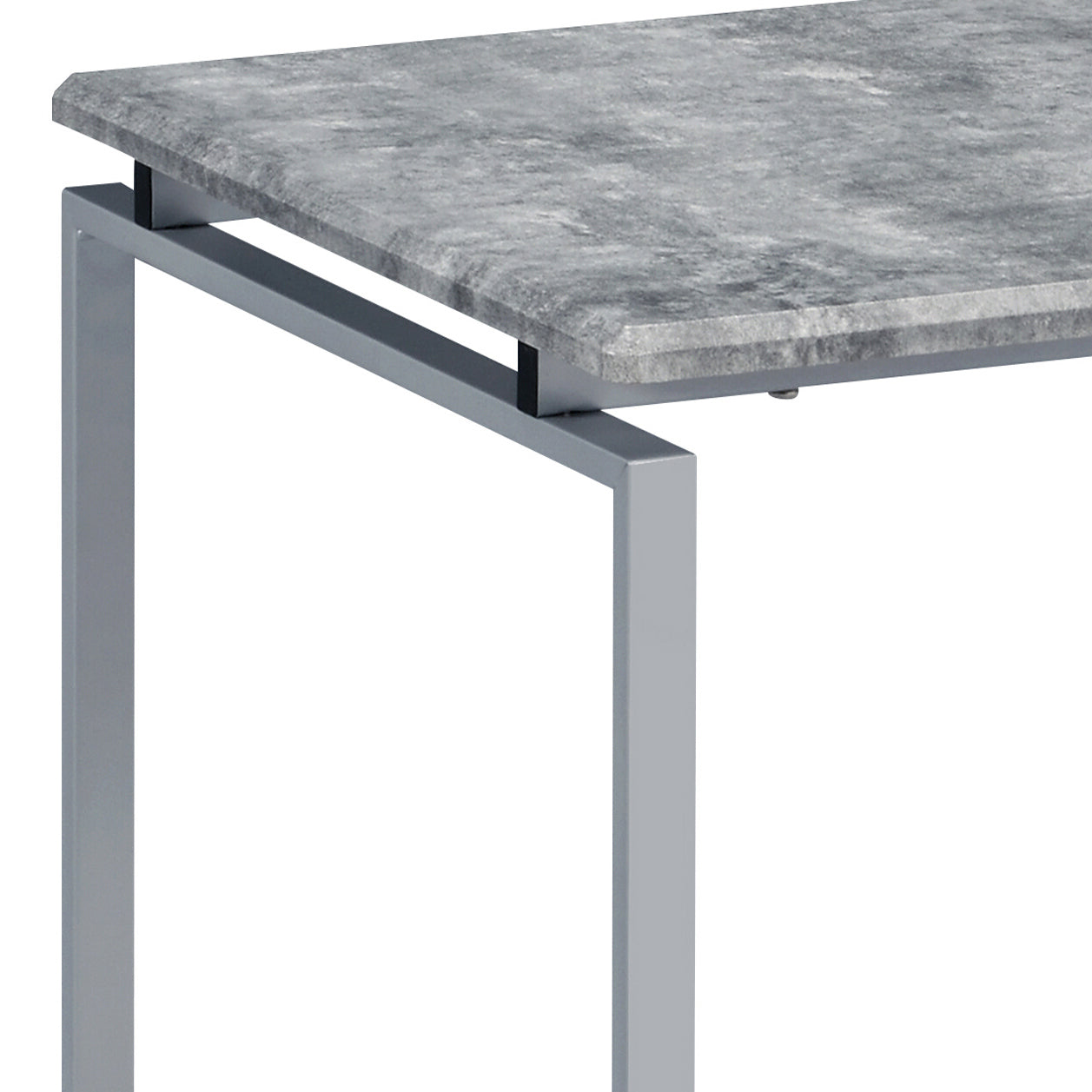 Closeup of a modern gray concretelook rectangular tabletop with silver metal legs