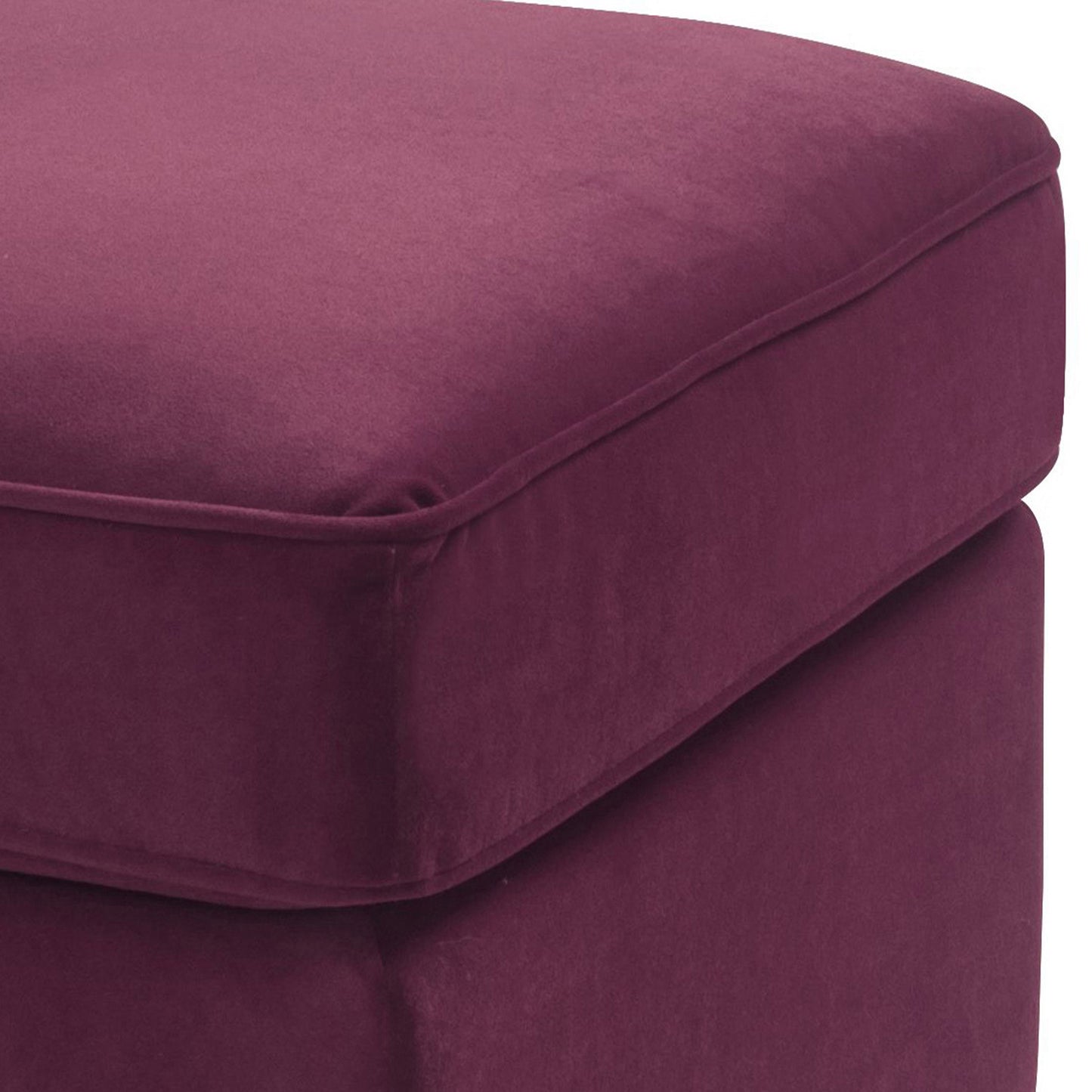 Plush deep plum velvet ottoman with piped edges perfect for footrest or extra seating