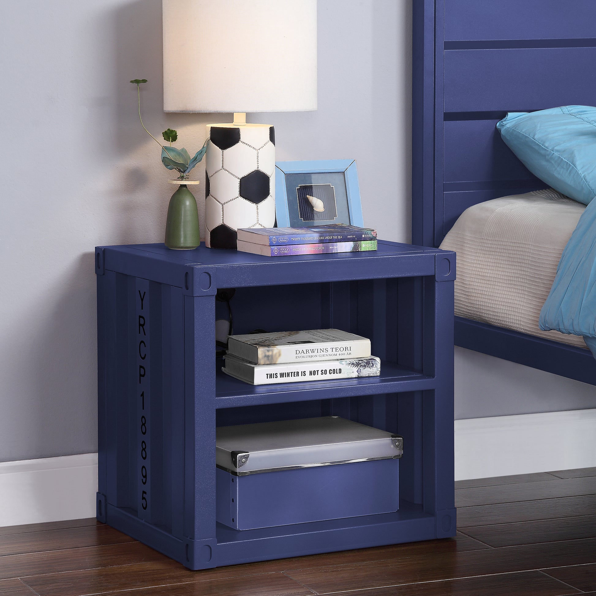 Navy blue industrial style nightstand with two open shelves and a storage box