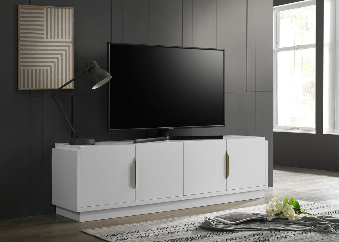 Modern white TV stand with gold handles showcasing a large flatscreen television