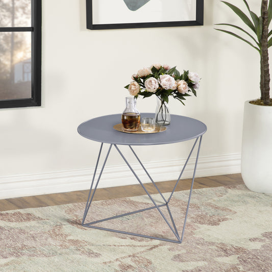 Sleek grey metal accent table with a circular top ideal for a modern living room