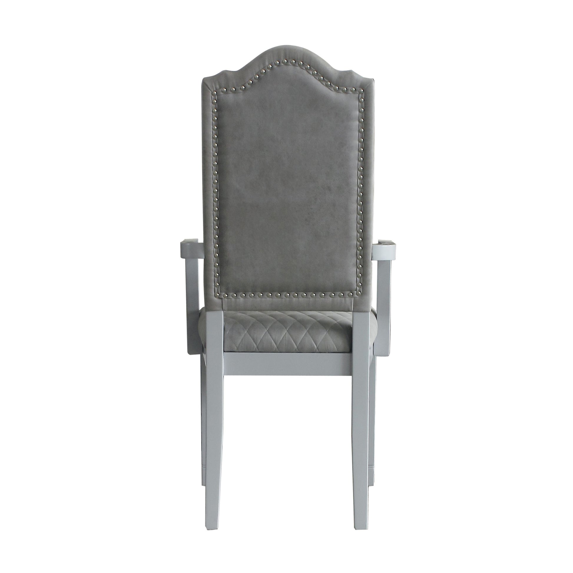 Tufted grey upholstered dining chair with silver nailhead trim and diamond tufted seat