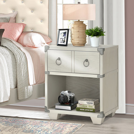 Aesthetic cream bedside table with two drawers featuring ring pulls and an open shelf holding a vintage camera and books