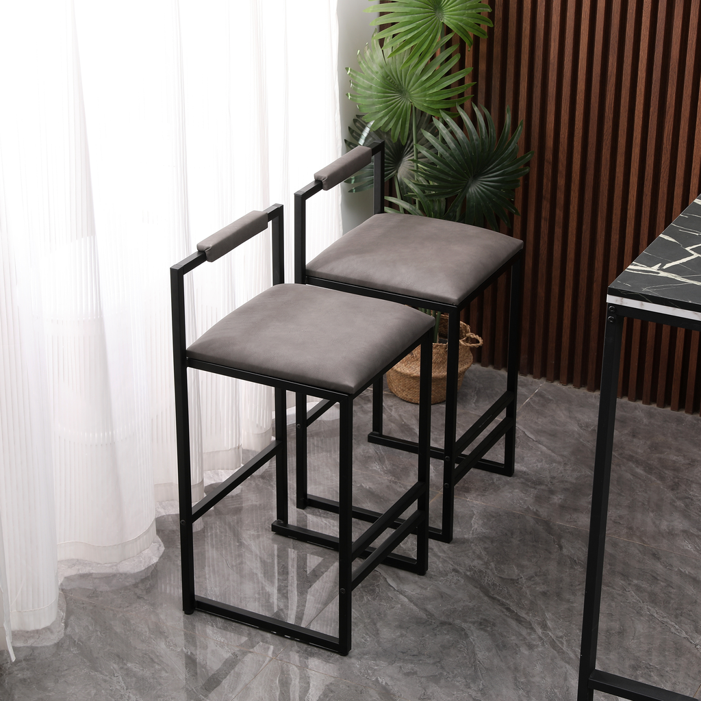 Modern grey upholstered bar stools with black metal frames and armrests