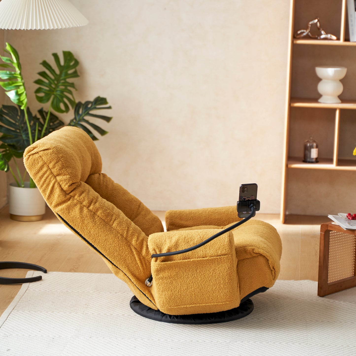 Mustard yellow boucle fabric recliner chair with phone holder and swivel base