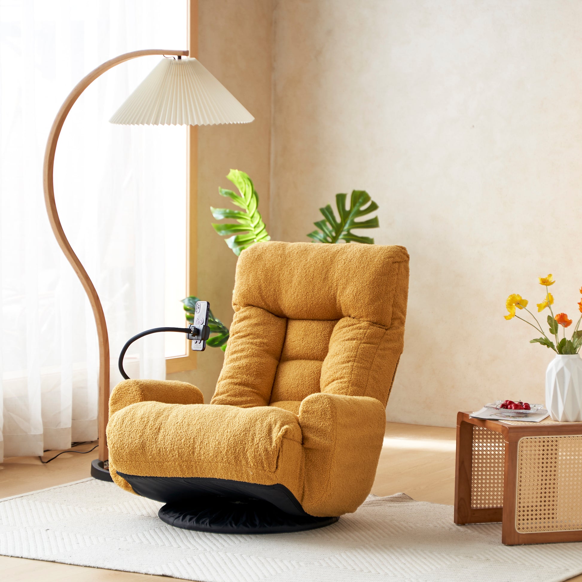 Yellow plush accent chair with adjustable lumbar support and phone holder