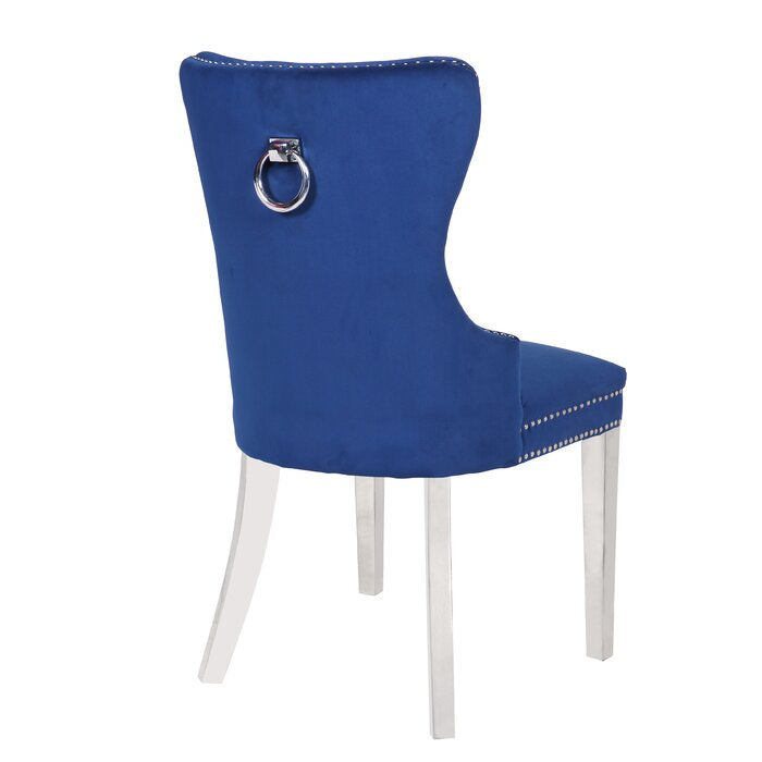 Royal blue velvet dining chair with silver ring pull and chrome legs