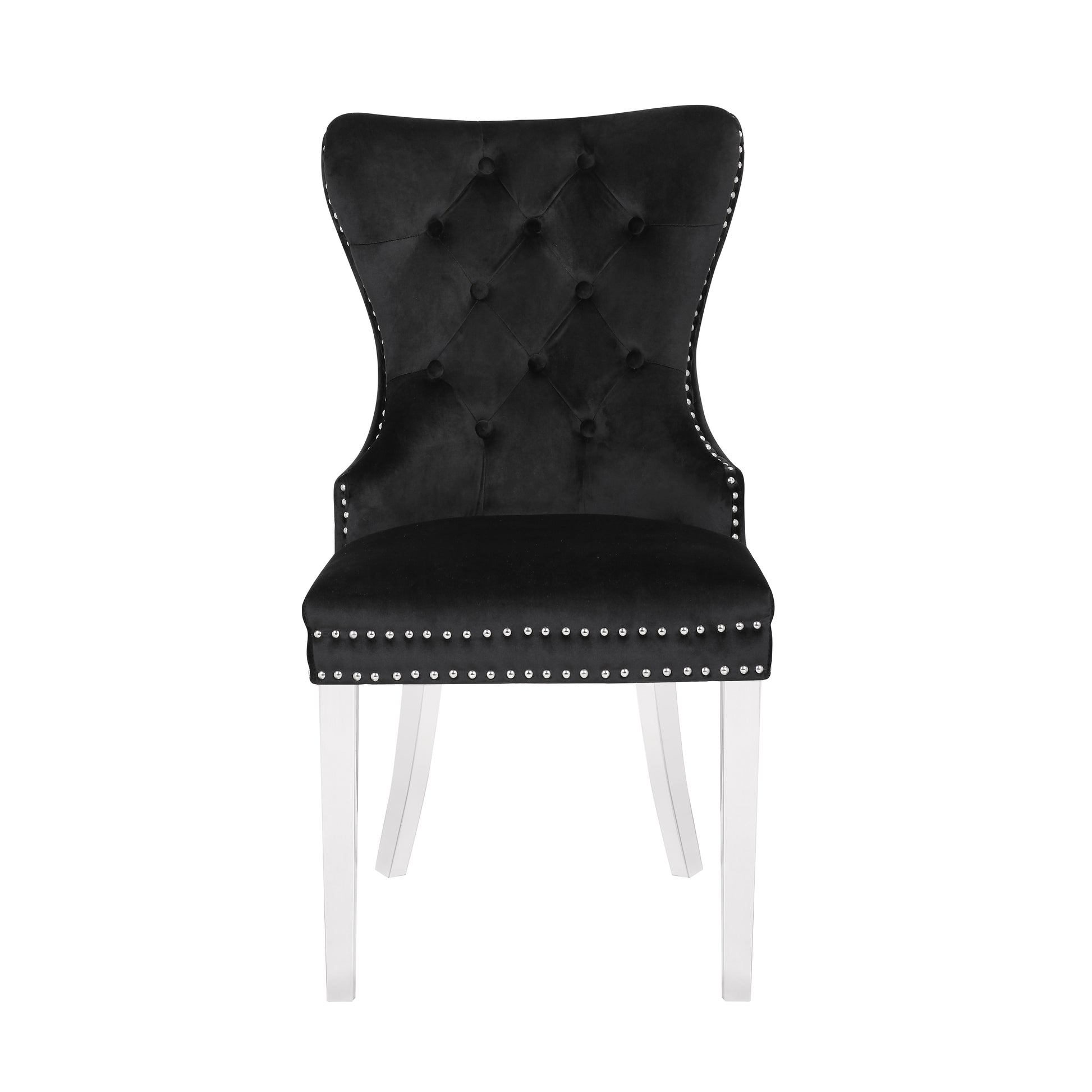 Black velvet dining chair with button tufting and silver nailhead trim