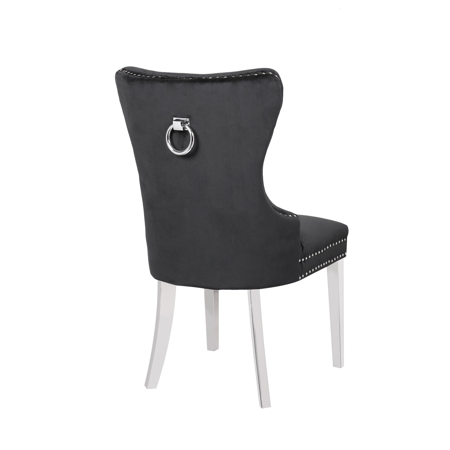 Dark gray velvet dining chair with silver studding and ring pull handle on back