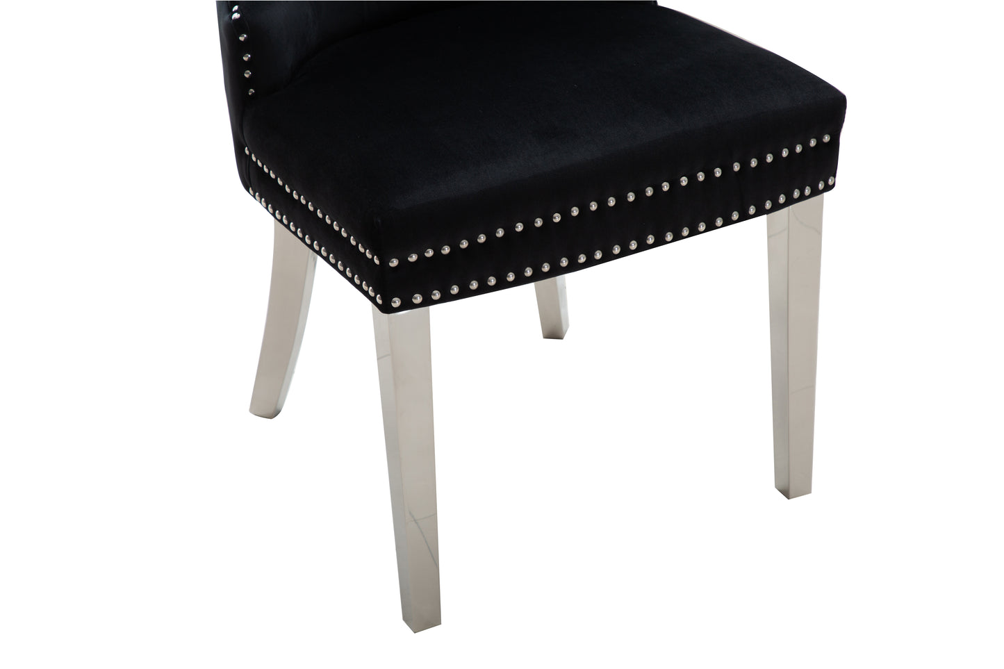 Black velvet dining chair with silver stud detailing and modern chrome legs