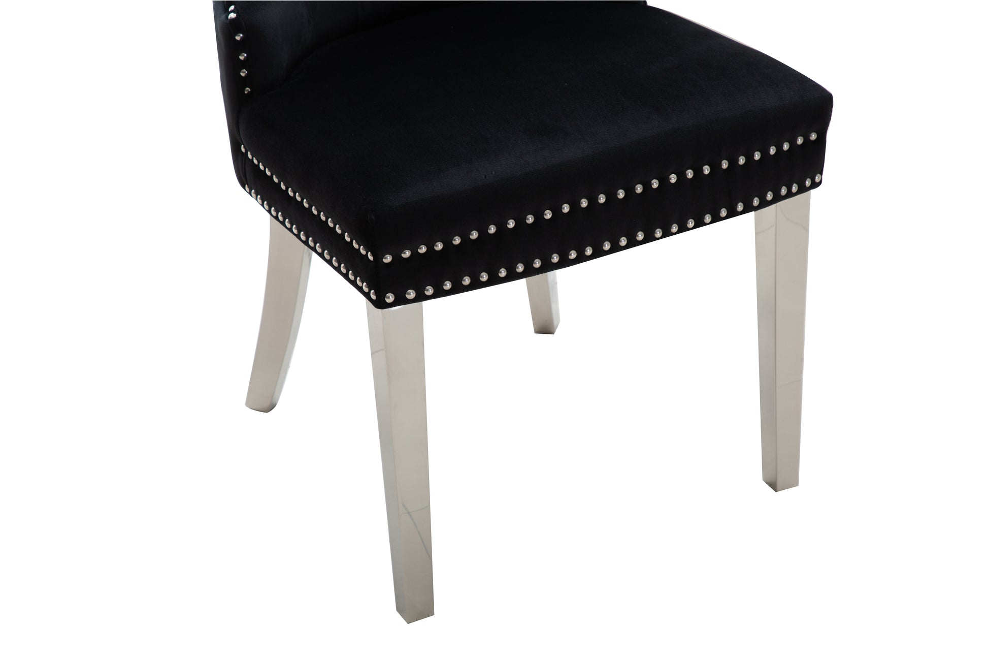 Black velvet dining chair with silver stud detailing and modern chrome legs