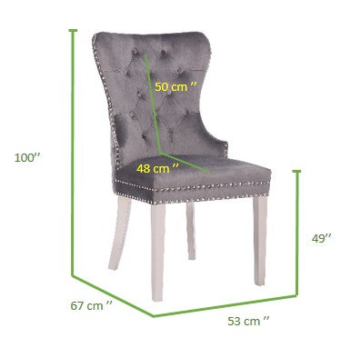 Tufted grey velvet dining chair with silver nailhead trim and light wood legs