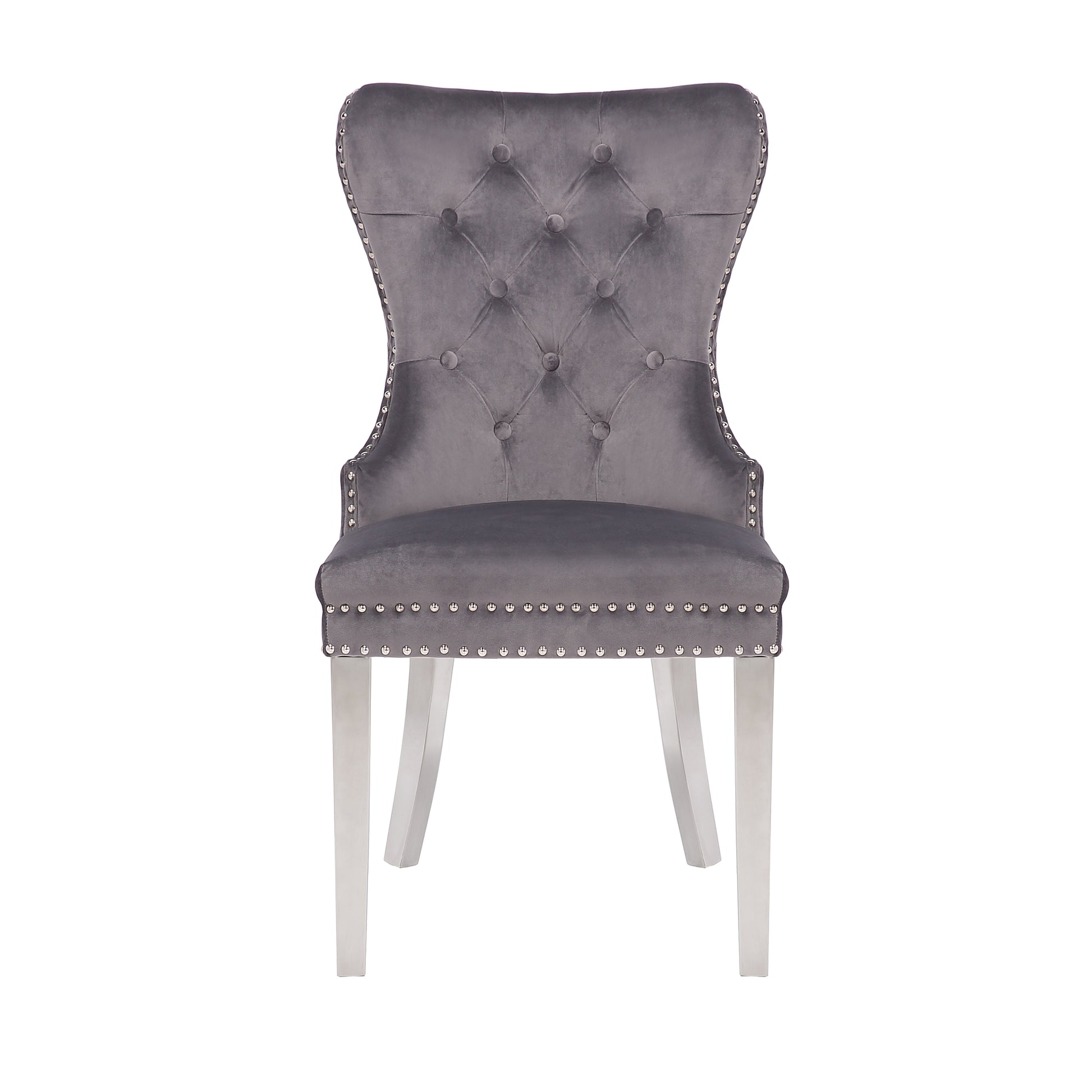 Grey velvet dining chair with tufted back and silver nailhead trim