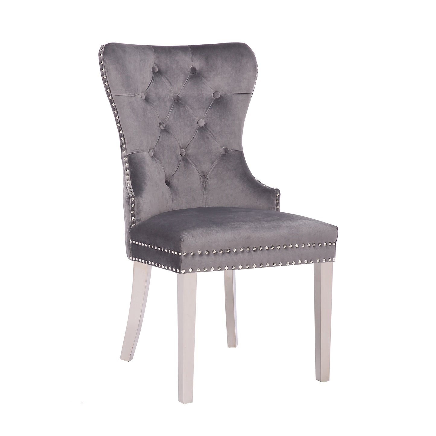 Grey velvet dining chair with diamond tufting and silver nailhead trim