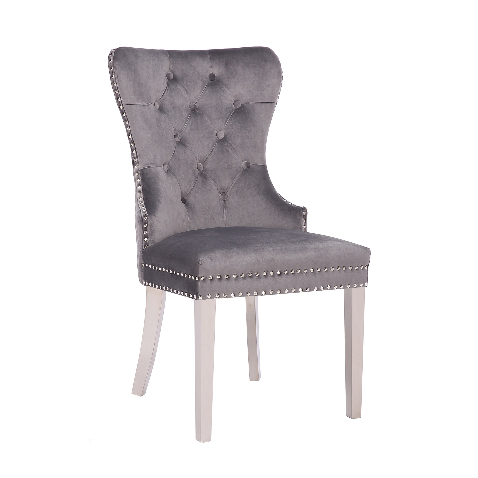 Grey velvet dining chair with diamond tufting and silver nailhead trim