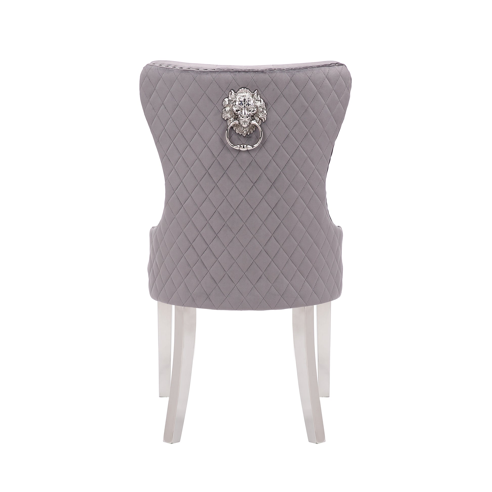 Grey quilted velvet dining chair with lion head knocker on back